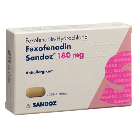 Boîte de Fexofenadine et symbole pharmacie en ligne